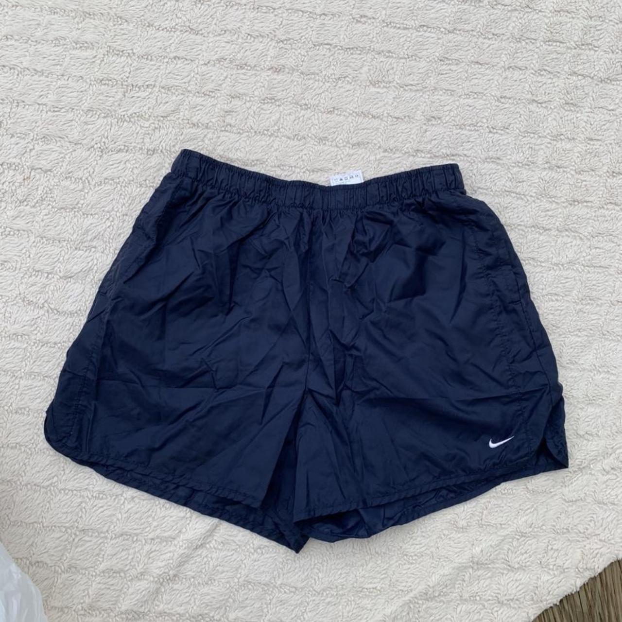 90’s Navy Nike shorts in great condition. Only flaw... - Depop