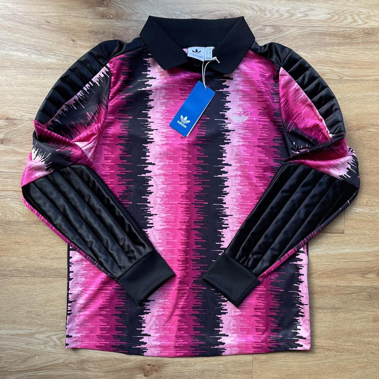 Pink ADIDAS football shirt. Would look better off... Depop