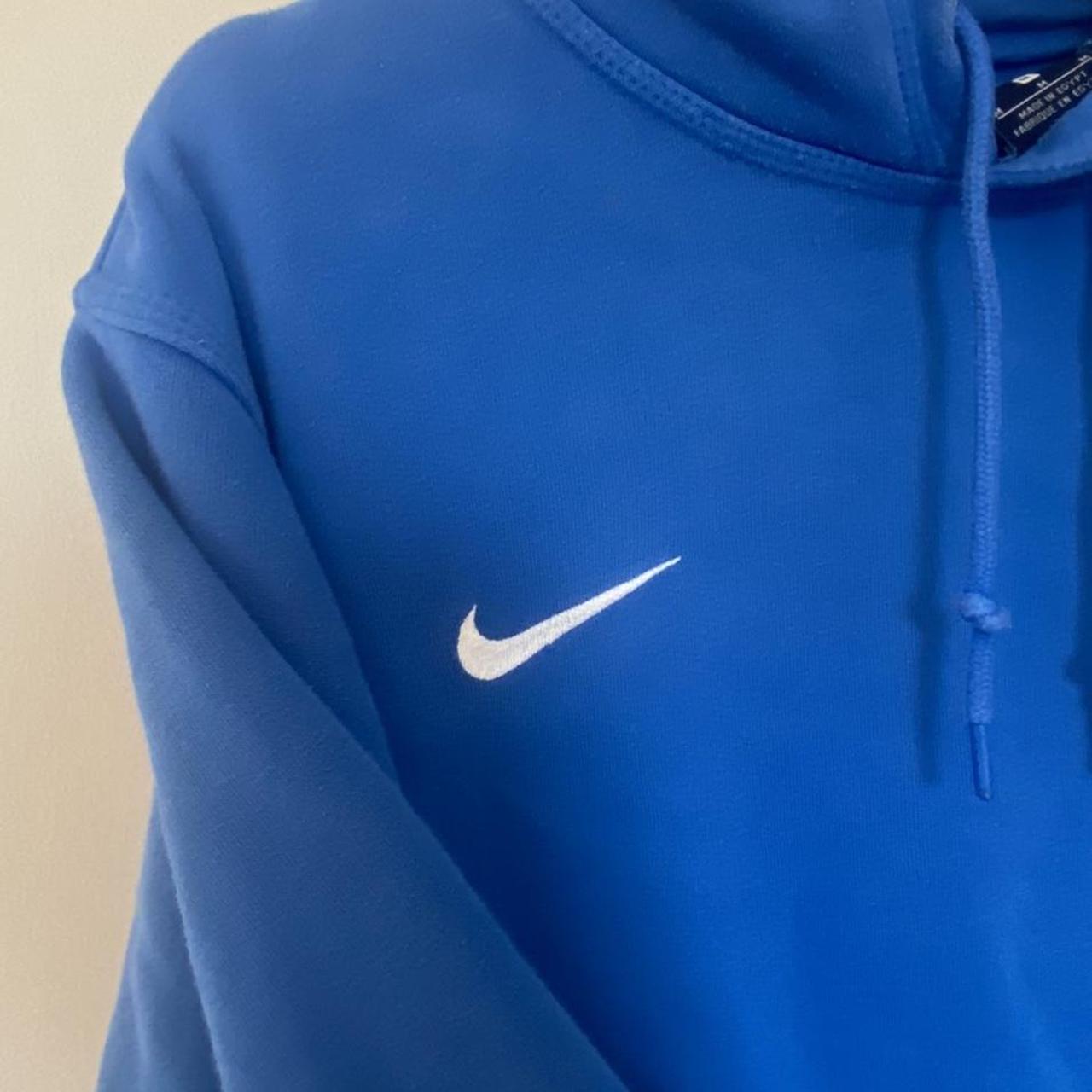 royal blue and gold nike shirt