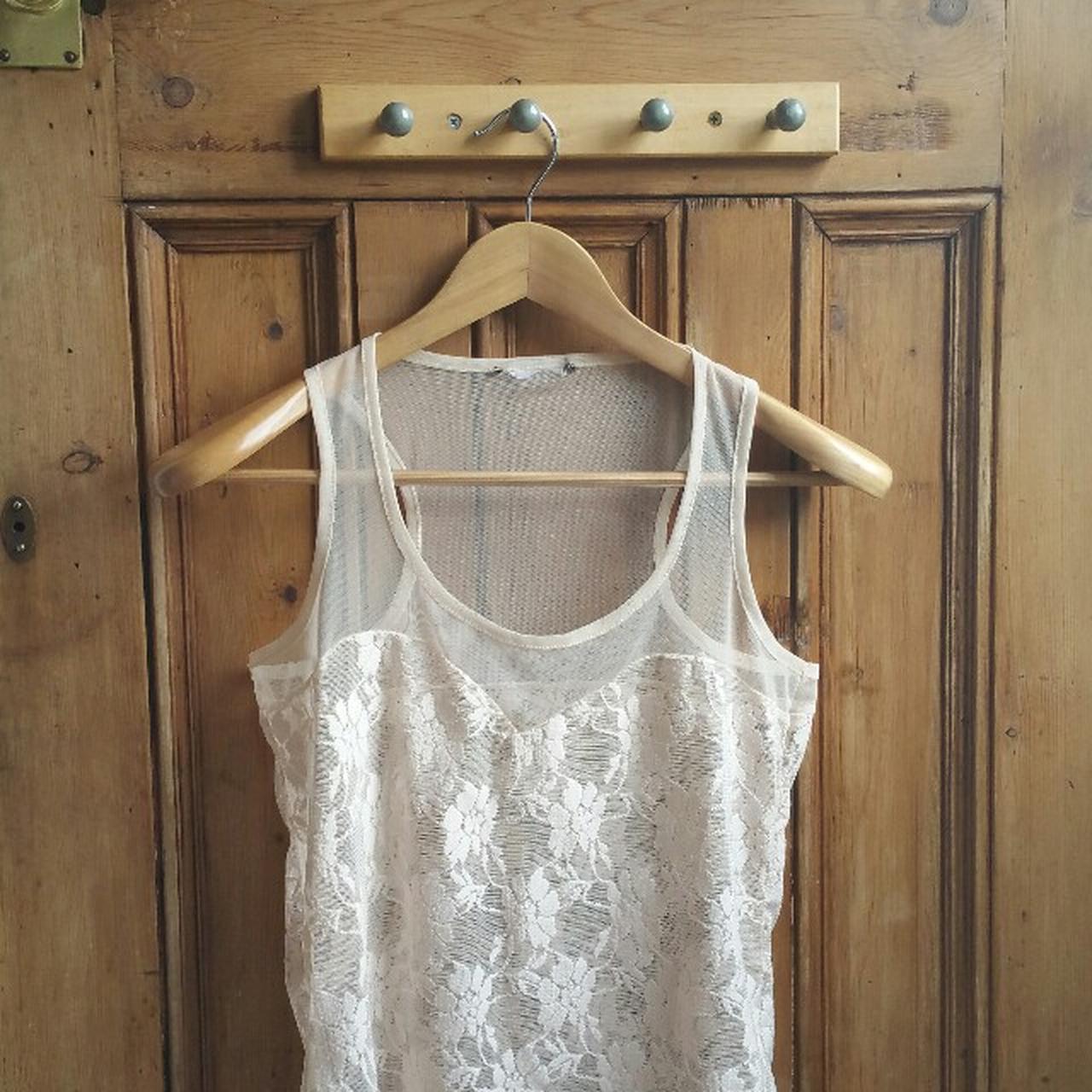 Lace sheer vest in a beige cream tone . Racer back... - Depop