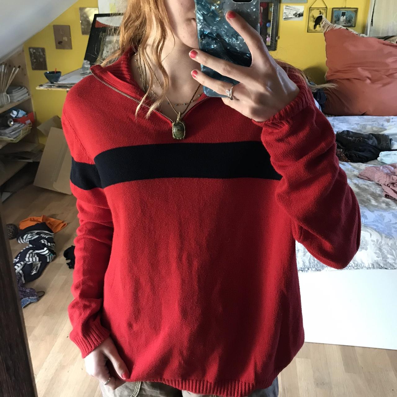 Rare Brandy Melville red sweater with black stripe.