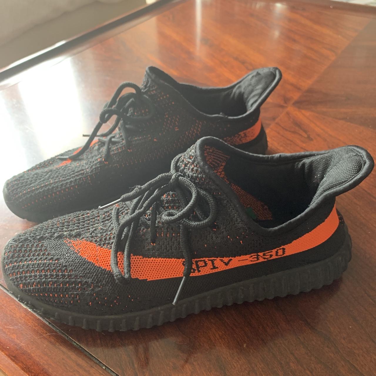 Fake yeezys black and on sale orange