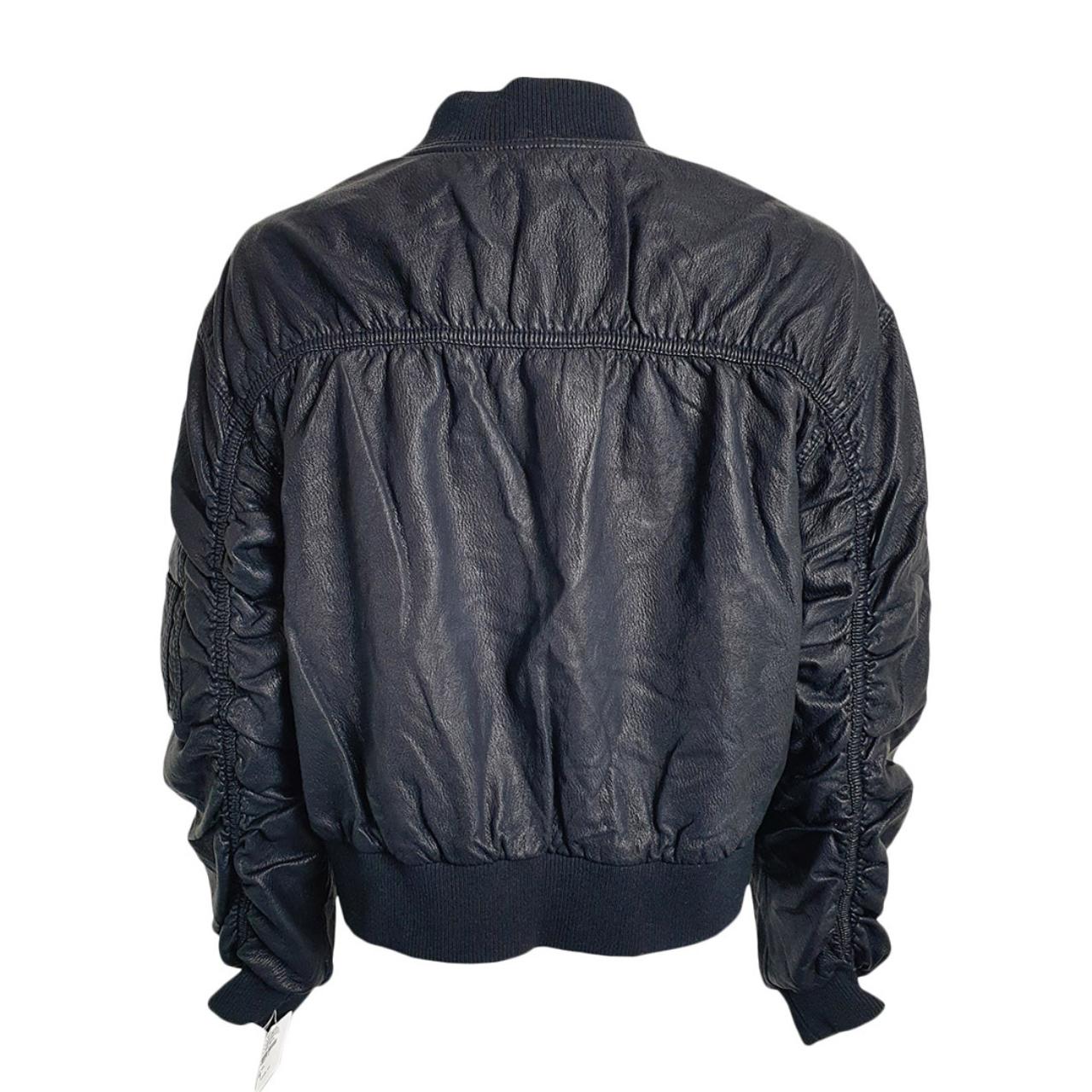 A trendy black jacket from Free People, made from... Depop