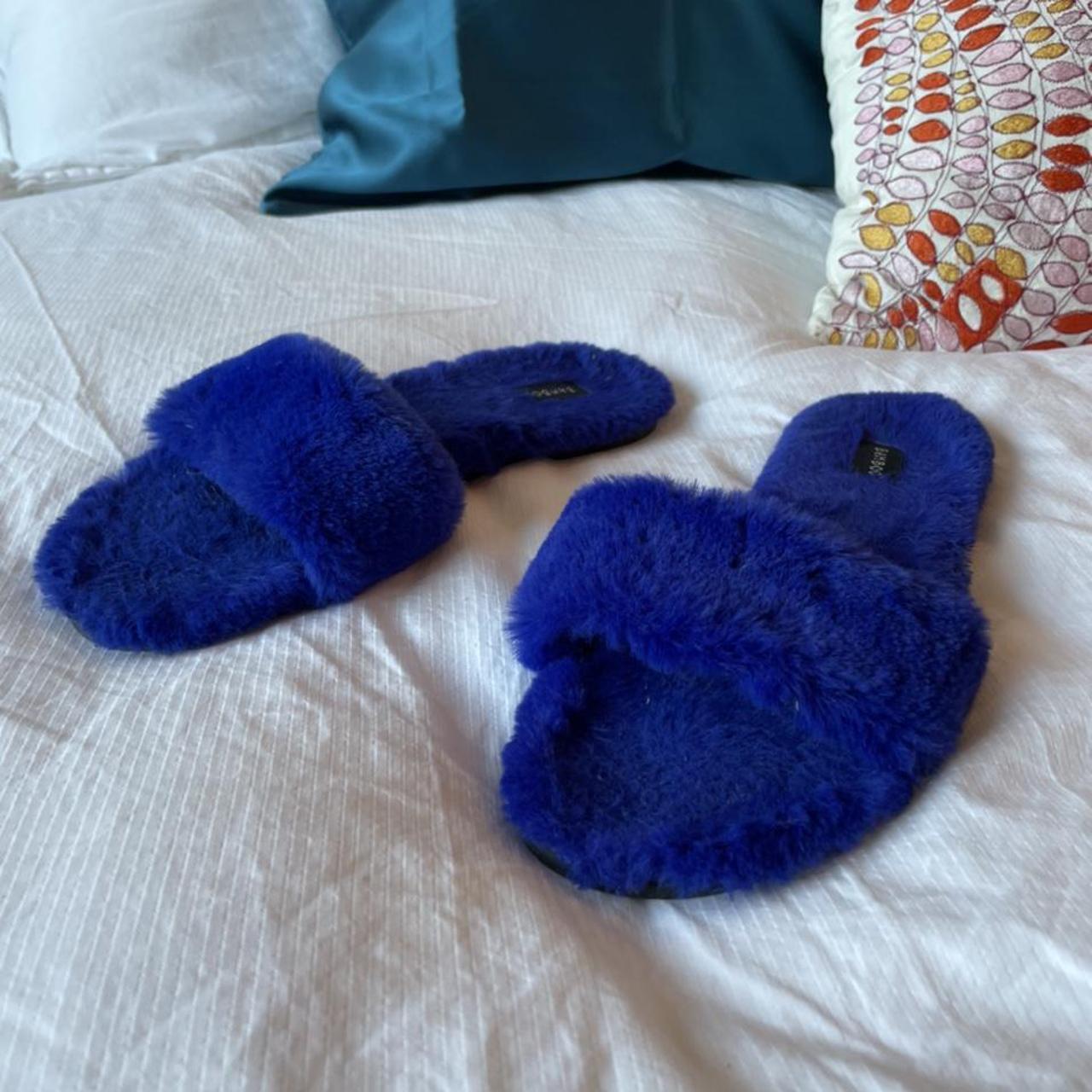 Fluffy blue slides, mostly worn inside. Depop