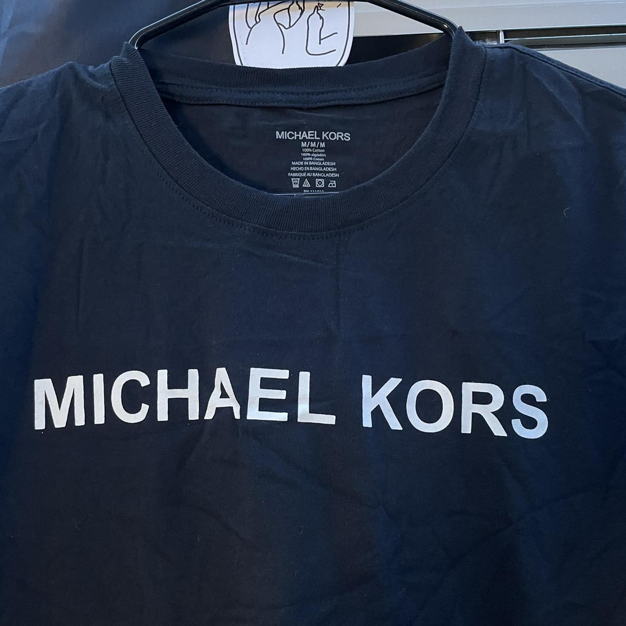 Michael Kors Men's Black T-shirt | Depop