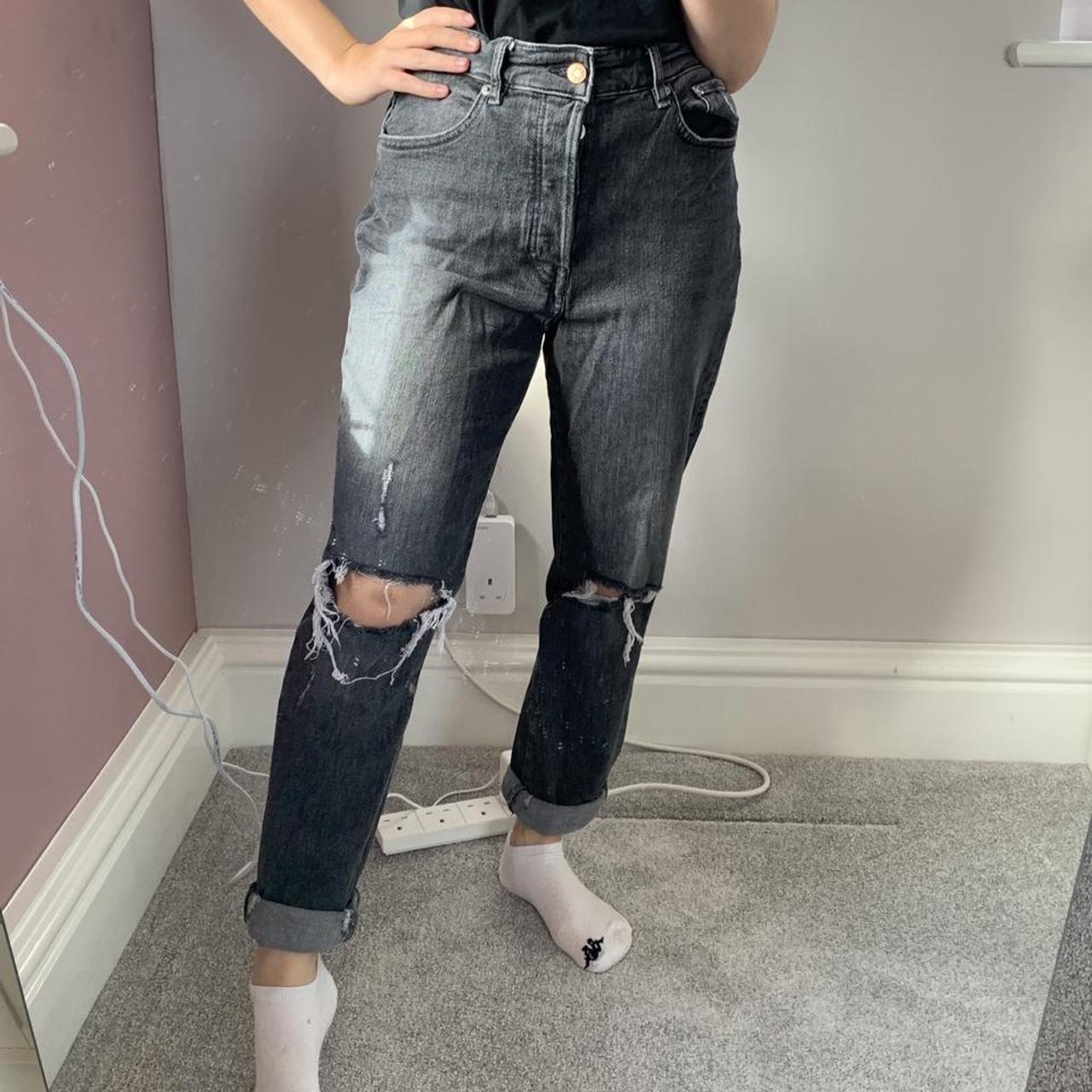 big ripped knee mom jeans