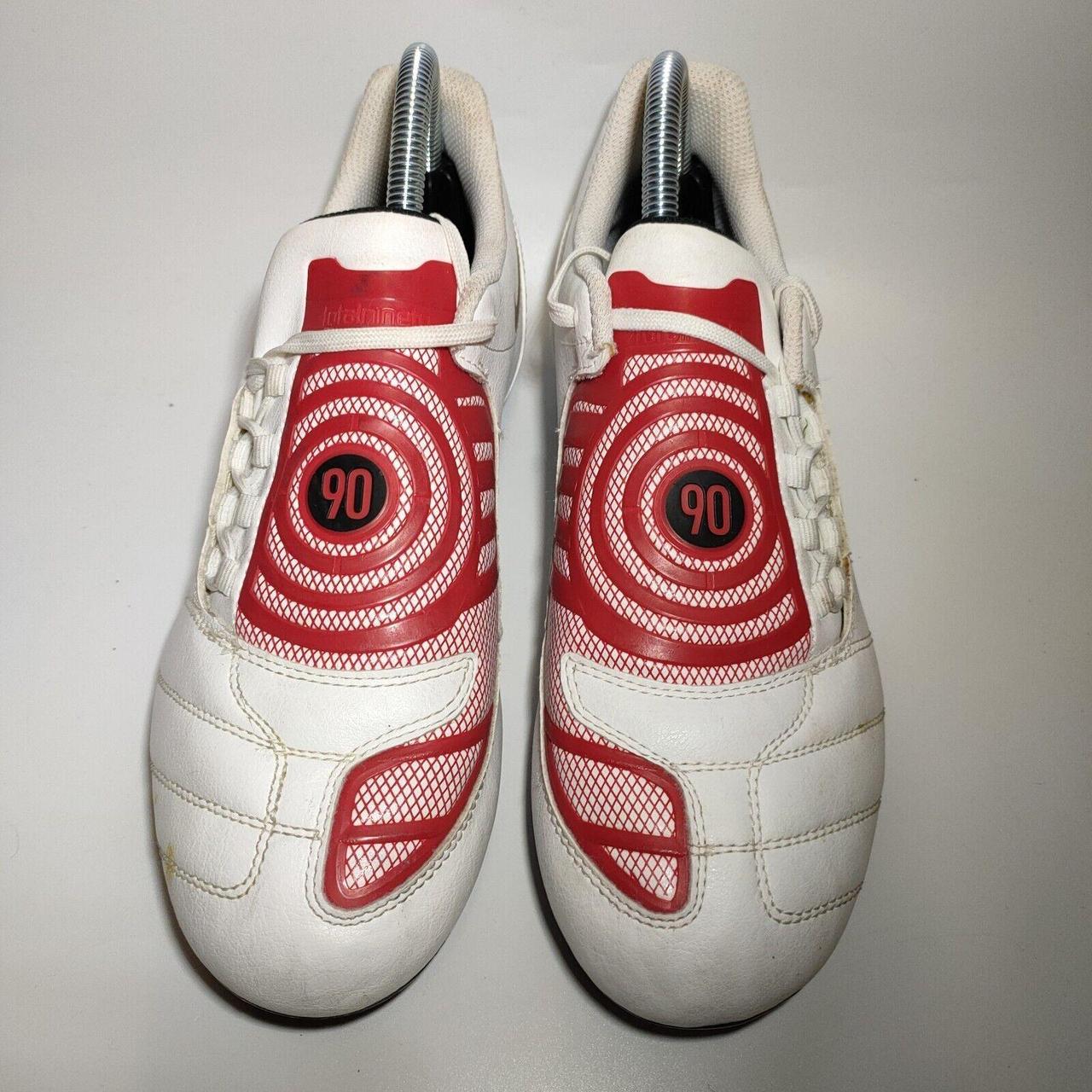 red and white total 90 boots