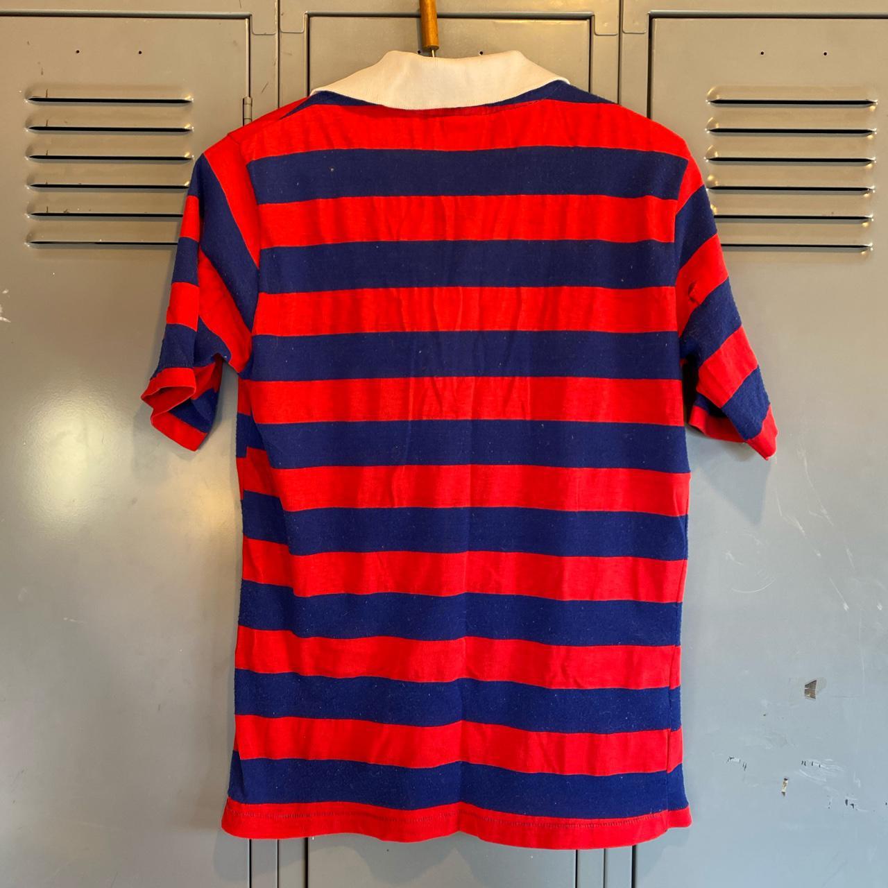 This men's red and blue striped polo shirt is... - Depop