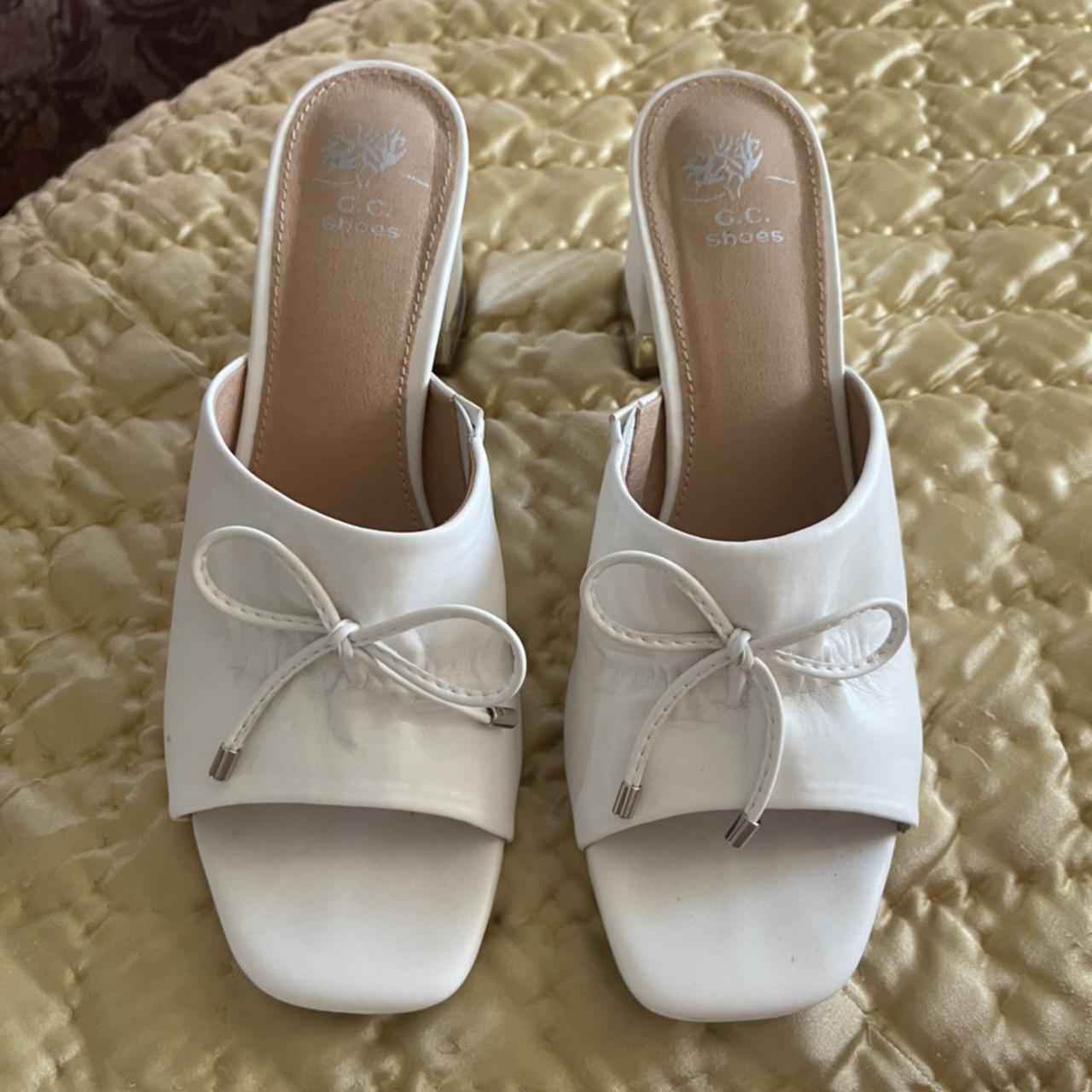 Block heel mules white with bow on top slightly... - Depop