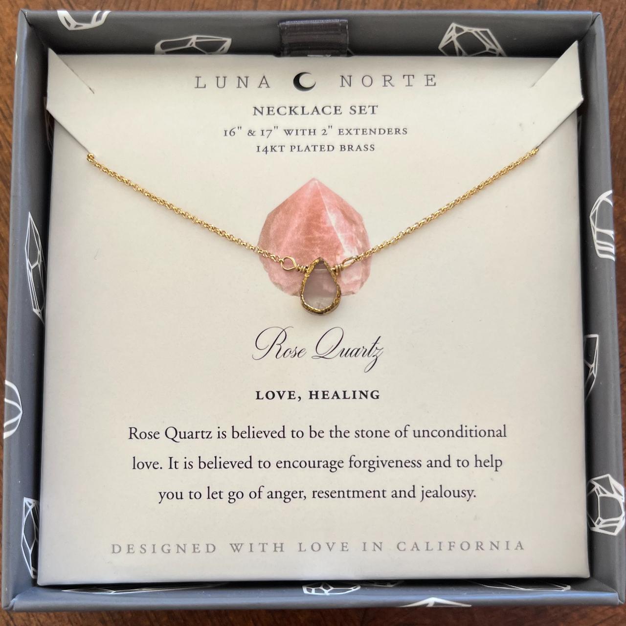 Raw rose quartz crystal cage necklace. Chain - Depop