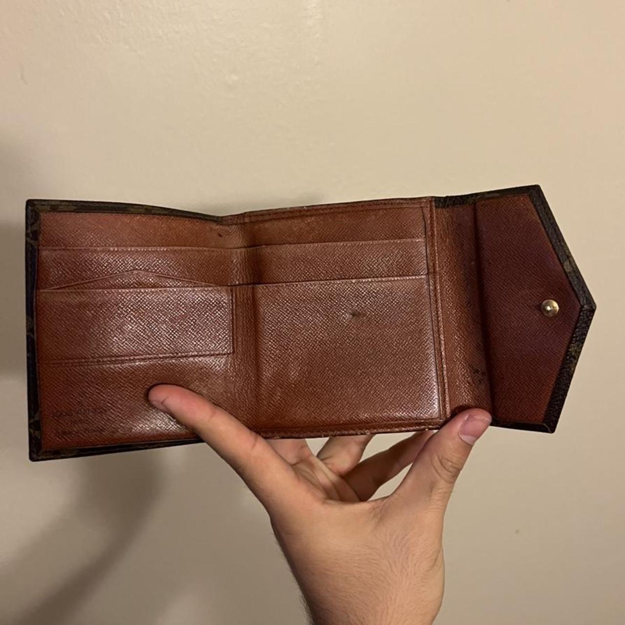 LV wallet condition: pretty worn in - Depop
