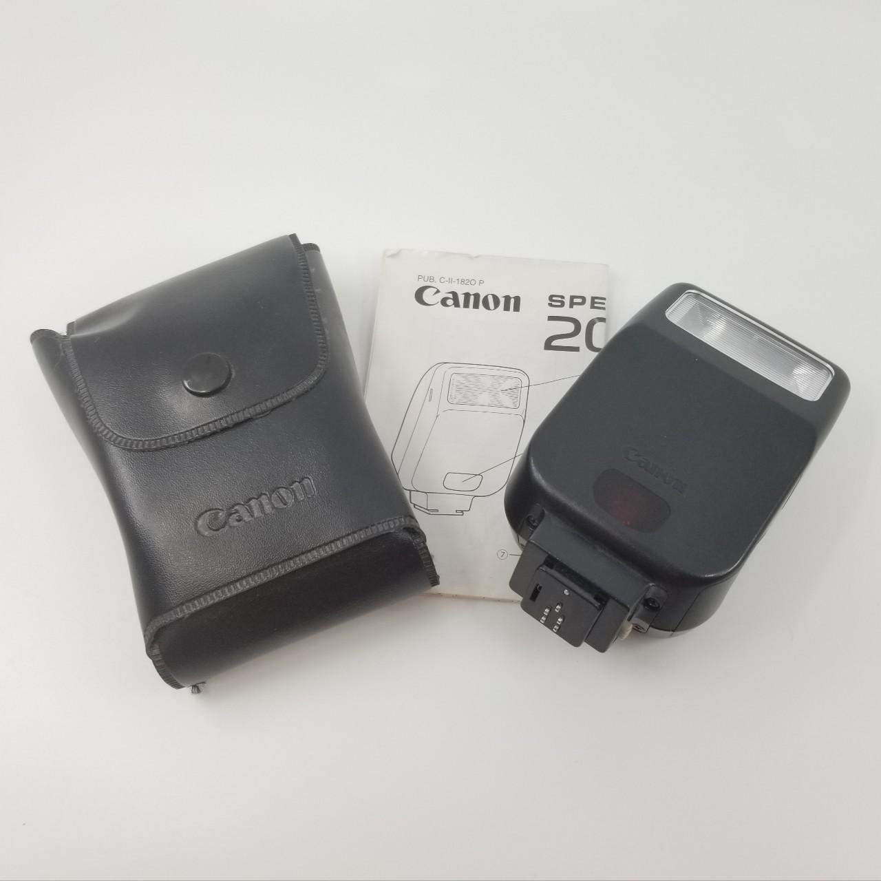 A vintage Canon Speedlite 200E flash. Includes a... Depop