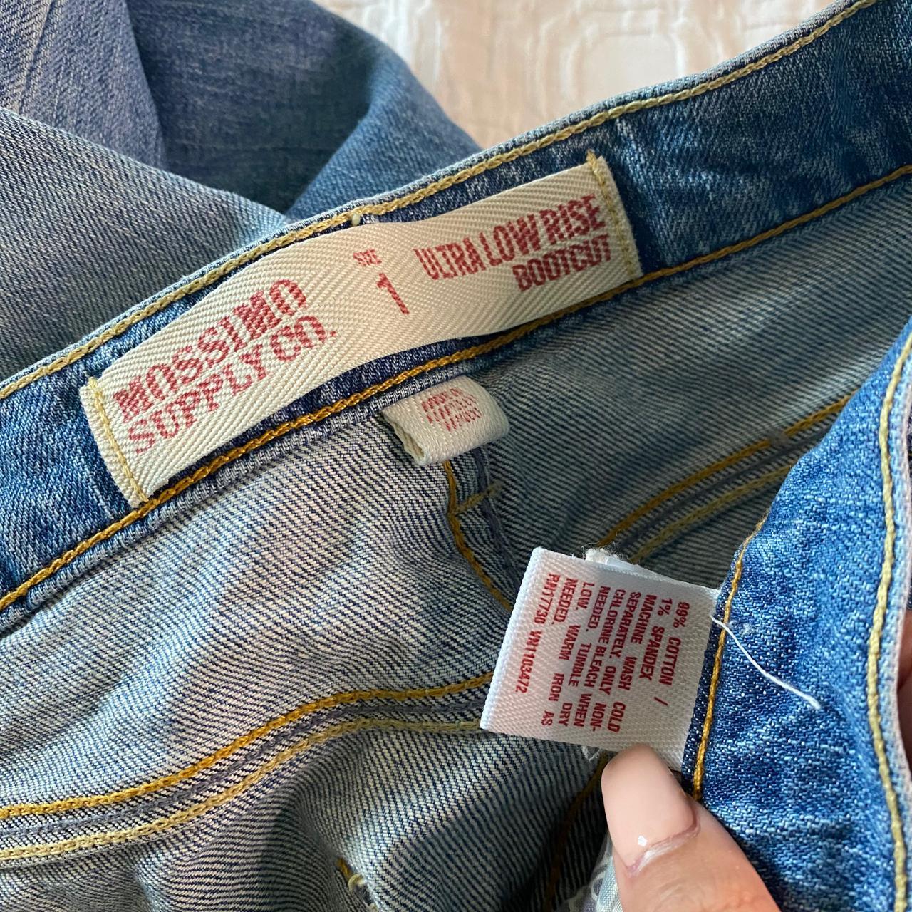 Mossimo Supply MediumWash Ultra Low Rise Bootcut... Depop