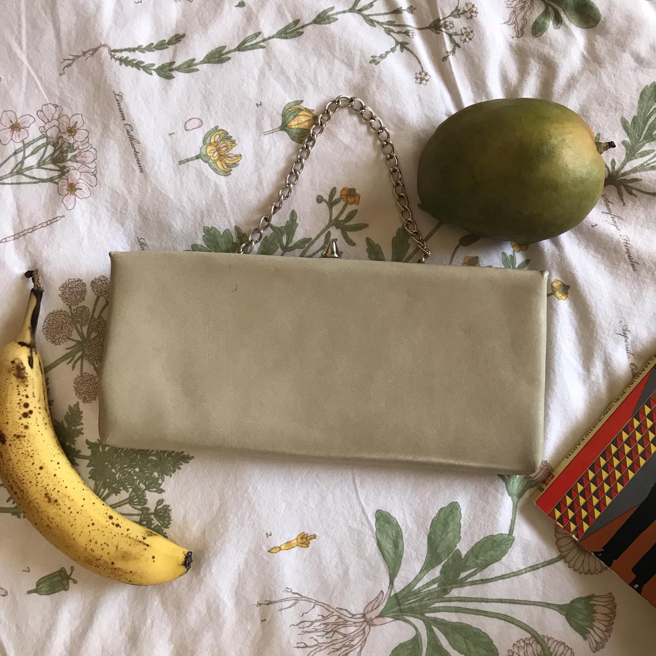 authentic gold distressed clutch labelled CLARE - Depop