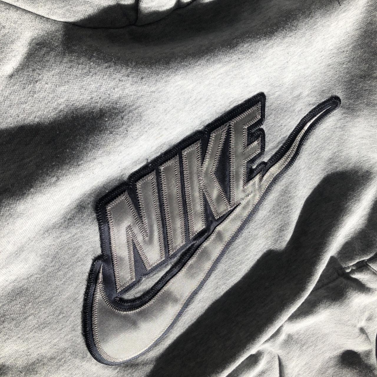 nike hoodie metallic logo