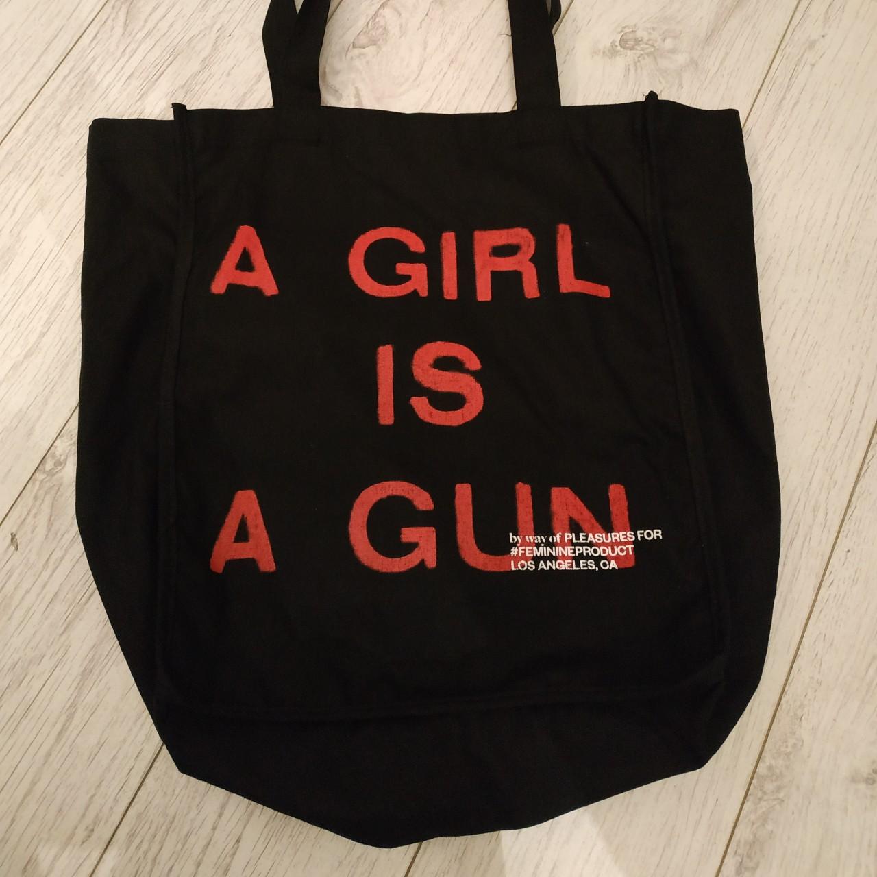 A girl is a gun tote sale