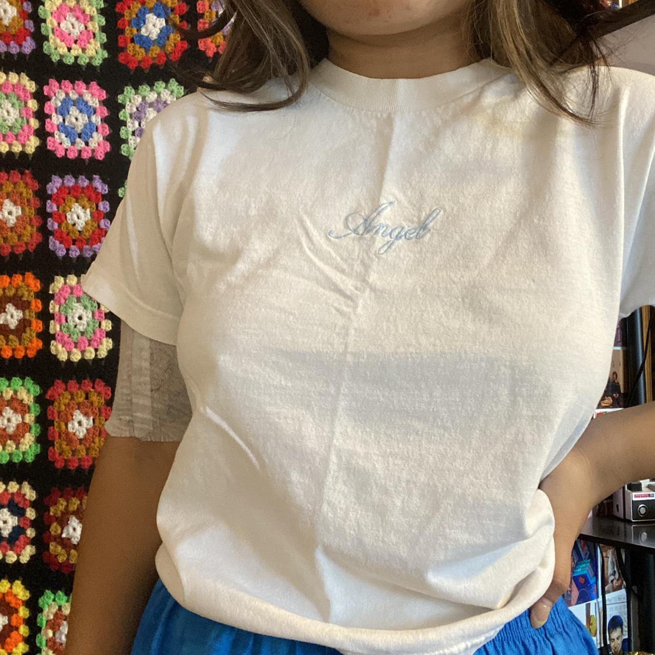brandy melville angel tee small hole under the... Depop