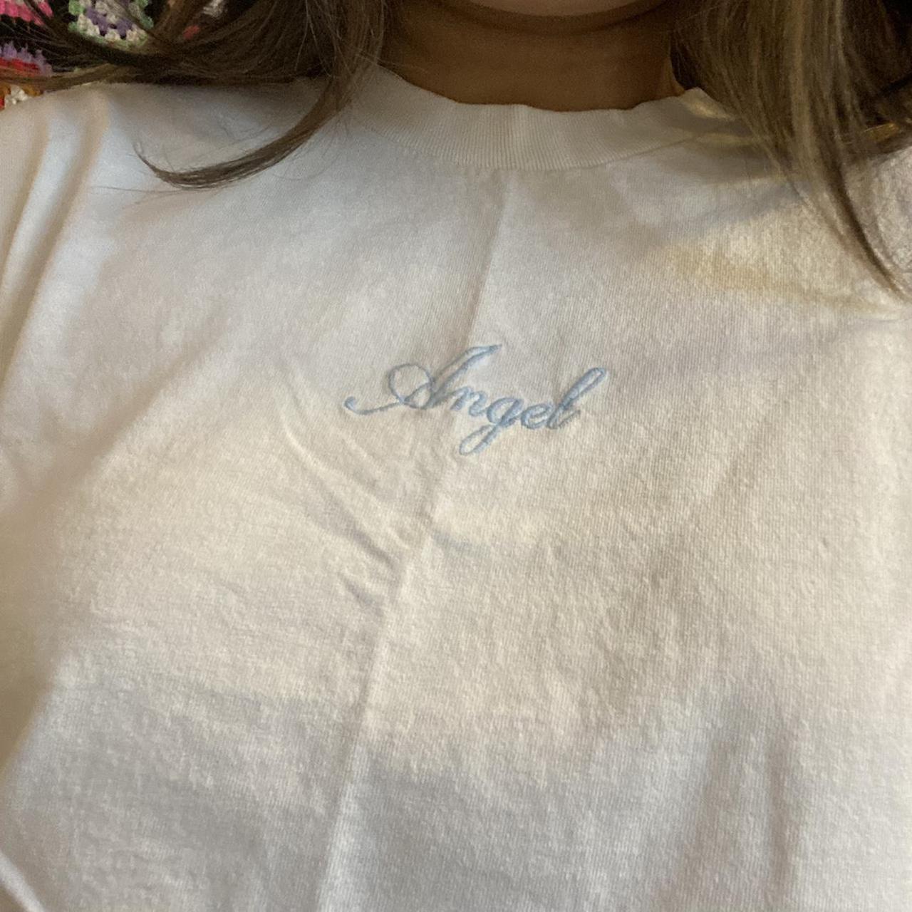 brandy melville angel tee small hole under the... Depop
