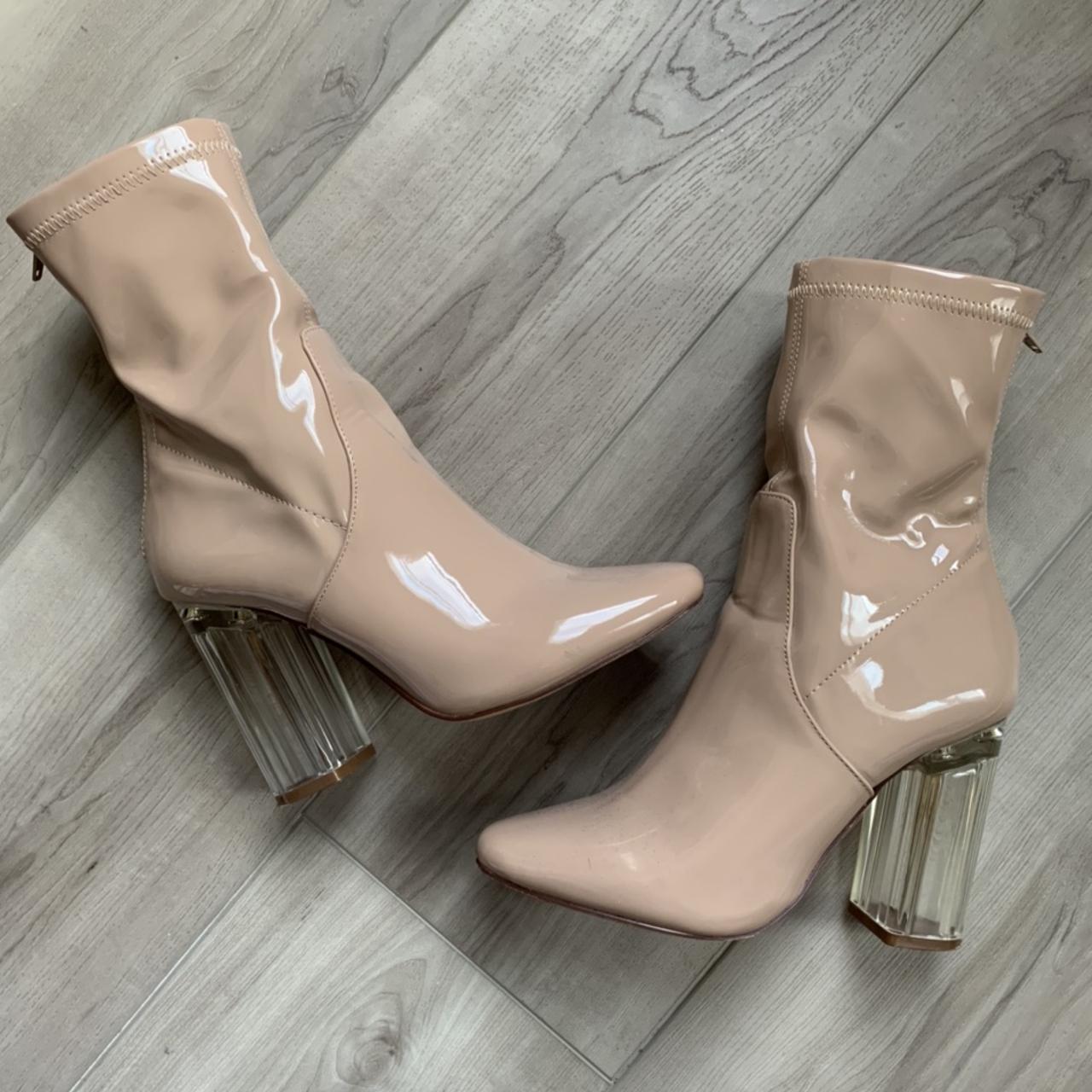 Nude latex heel boots. Worn once but stained them