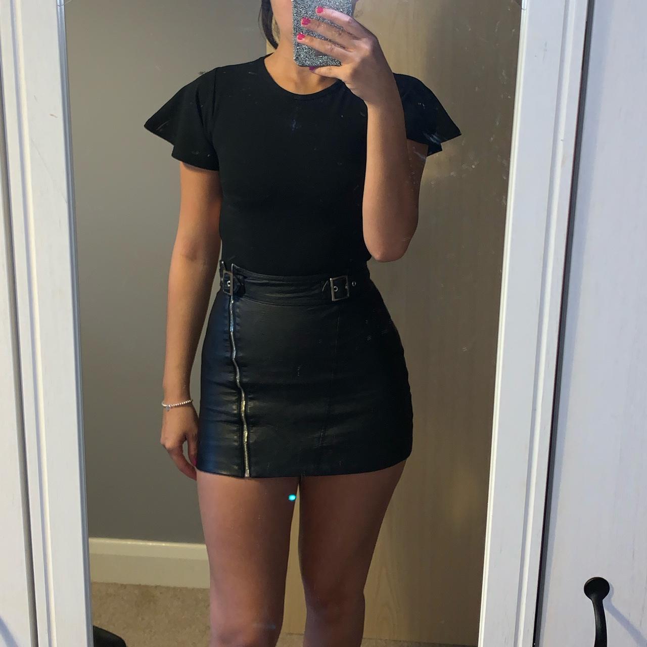 Black bodysuit with open back. Never worn still with... - Depop