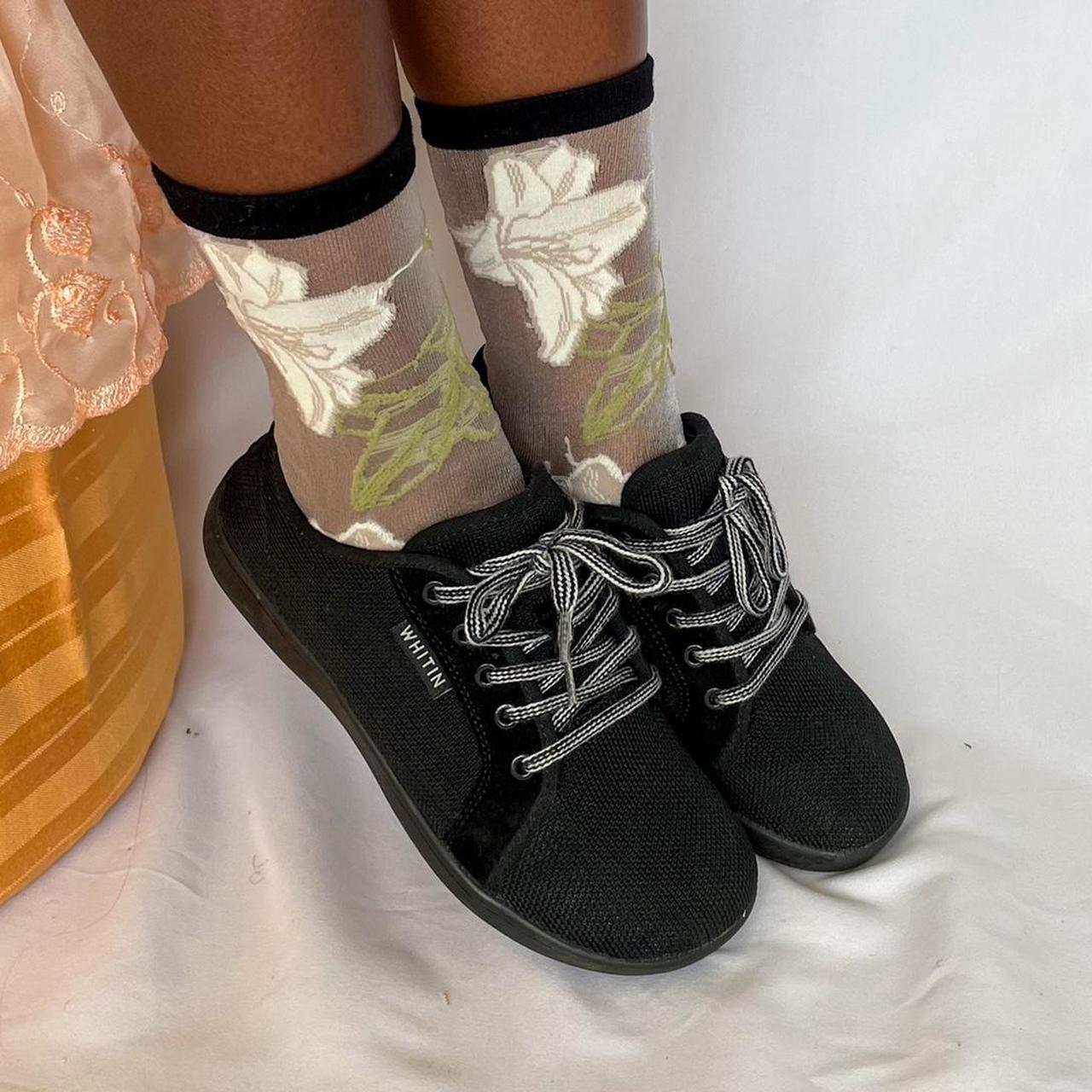 Black square toe sneakers. Has checkered white laces... Depop