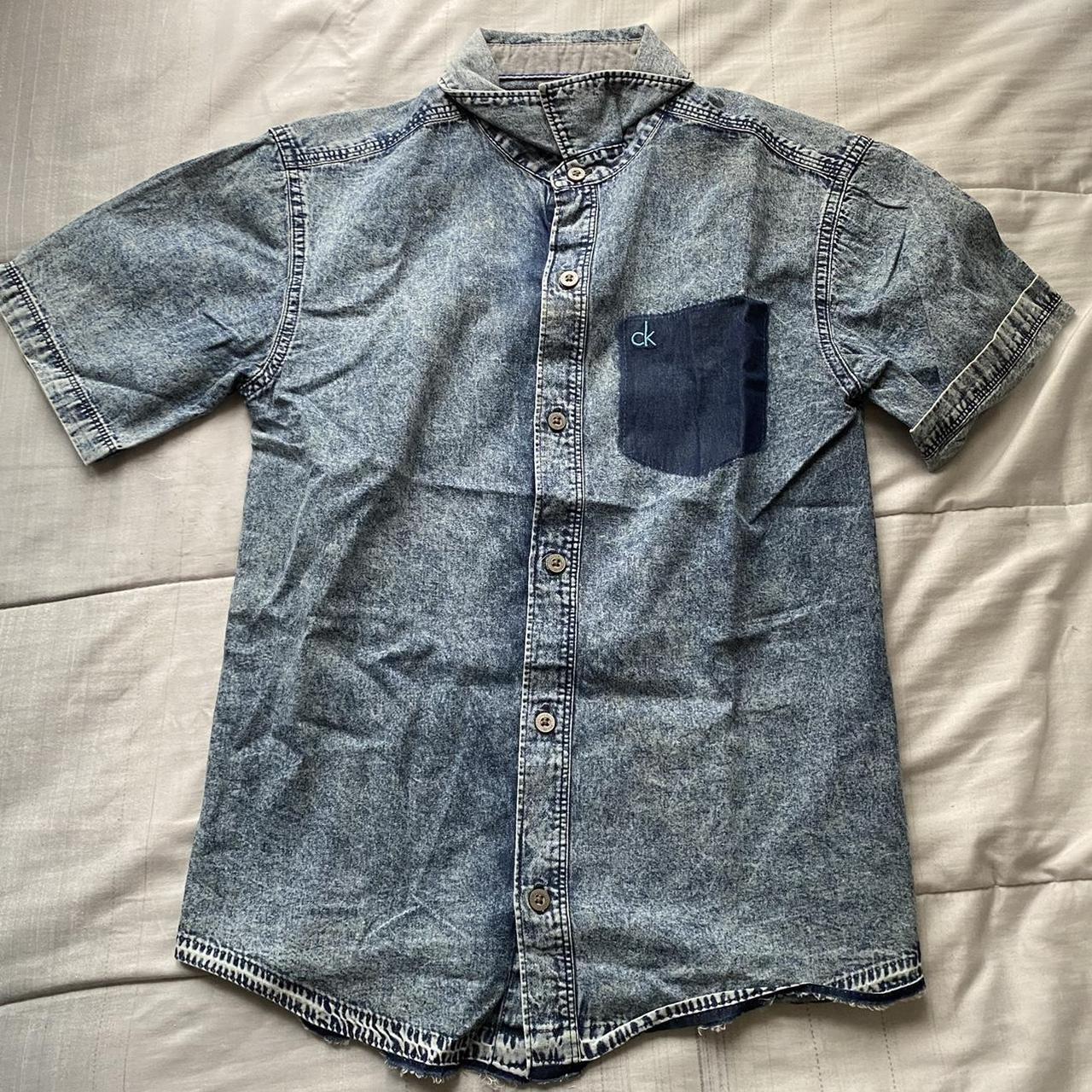 Light blue denim button up with a dark blue... - Depop