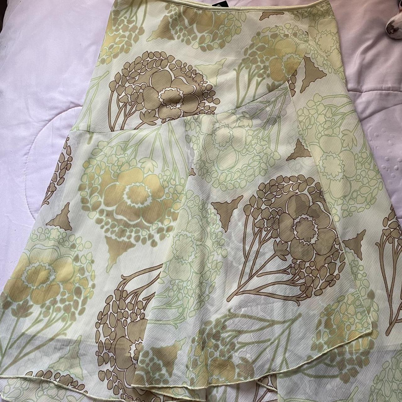 Yellow skirt with a green and brown floral and... - Depop