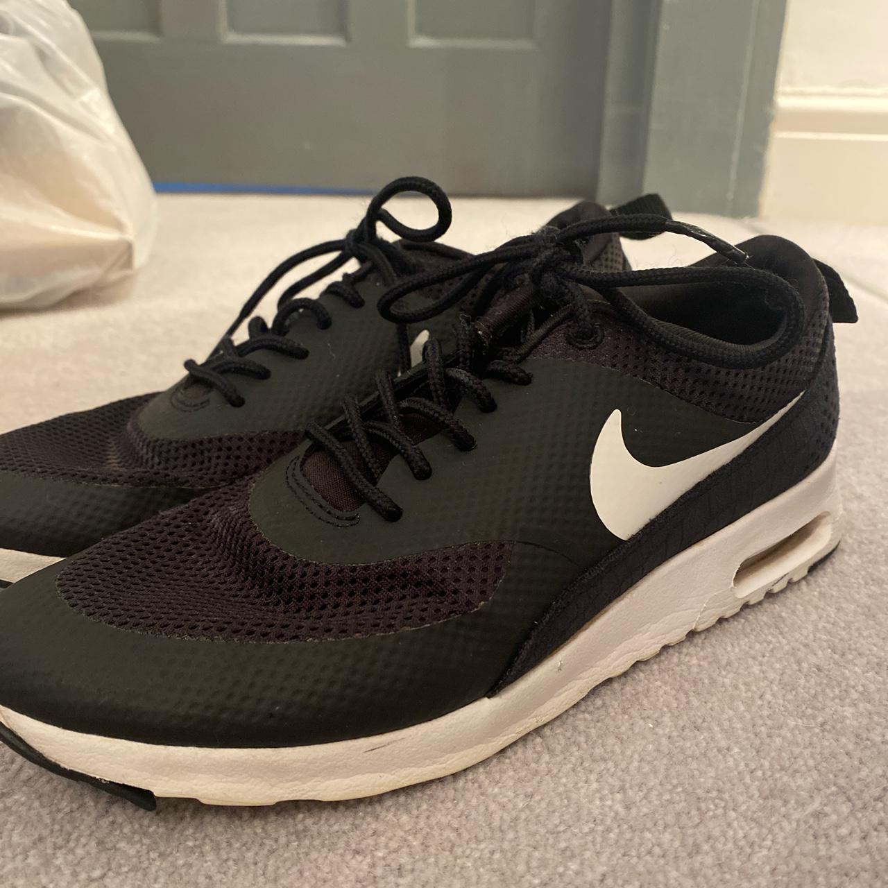 Womens Nike Theas in size 5. All black not purple. Depop