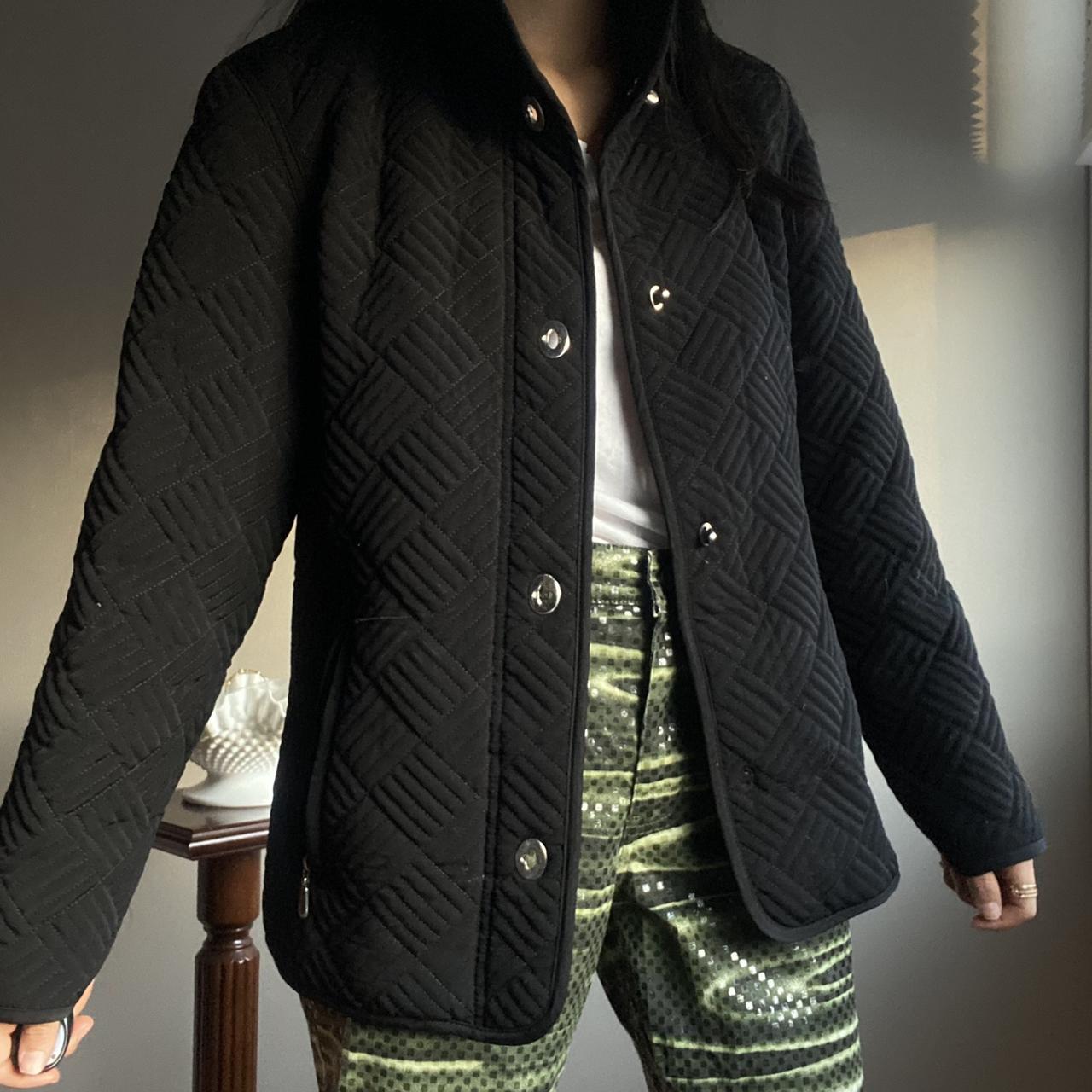Black quilted jacket. Labeled size XS by the brand... - Depop