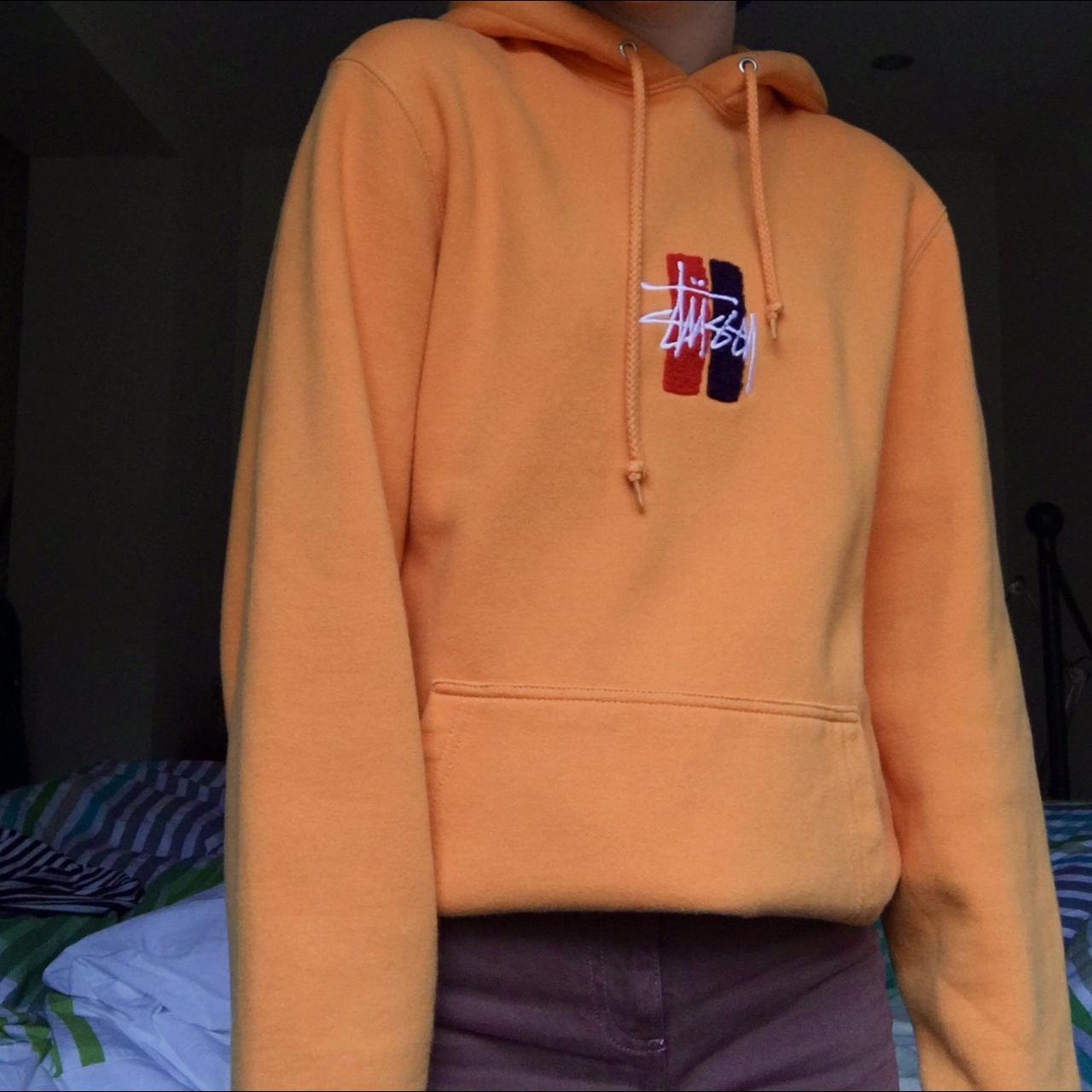 stussy orange sweatshirt