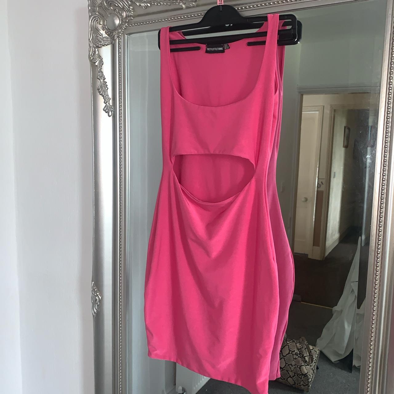 Kim Kardashian tight neon pink shiny cutout bodycon