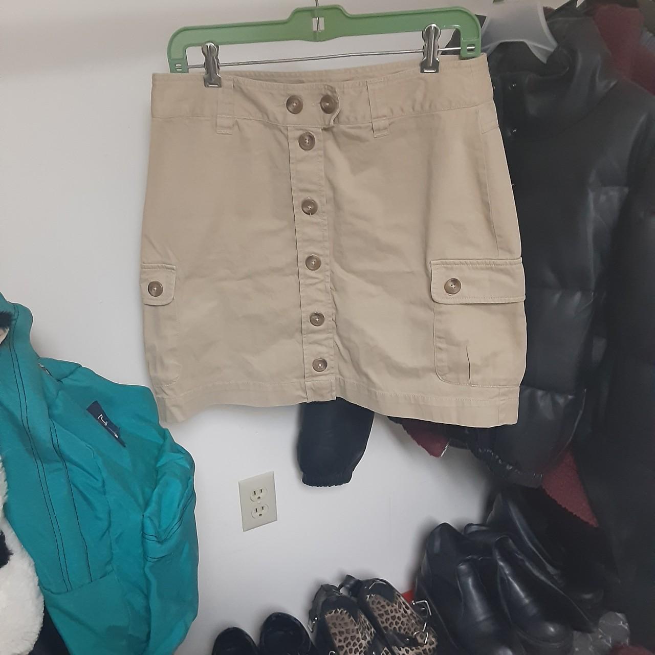 Khaki button down mini skirt by the brand Geoffrey... Depop