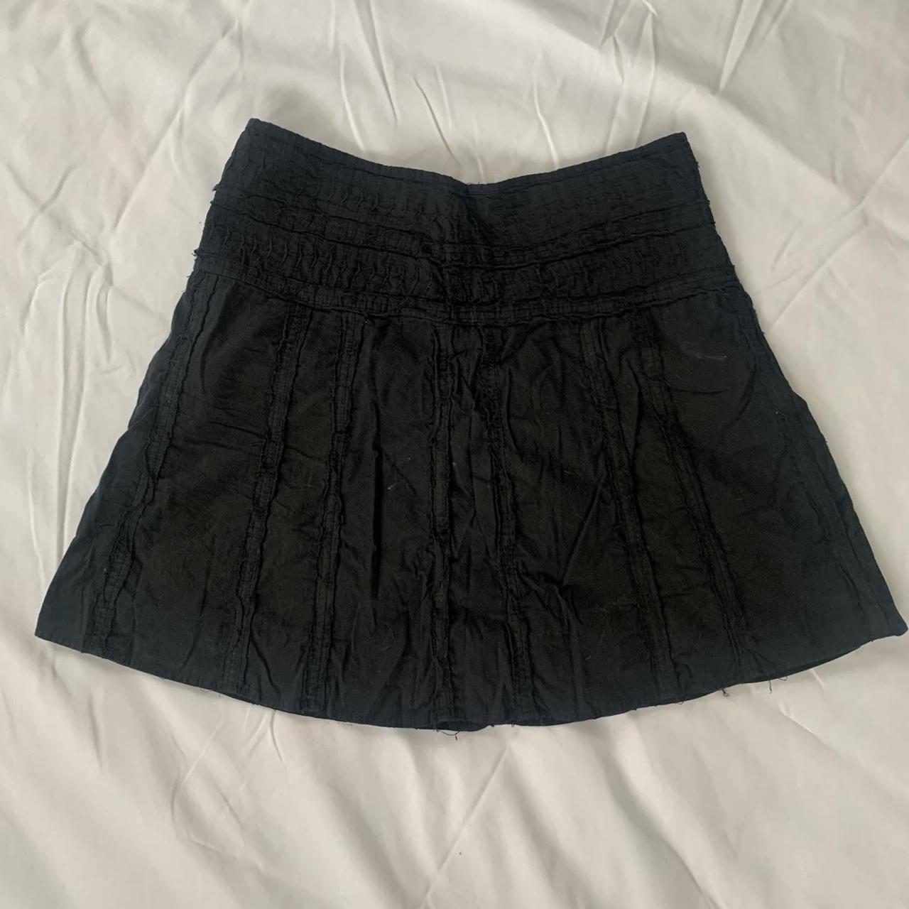 super cute black skirt! a bit frayed and has some... - Depop