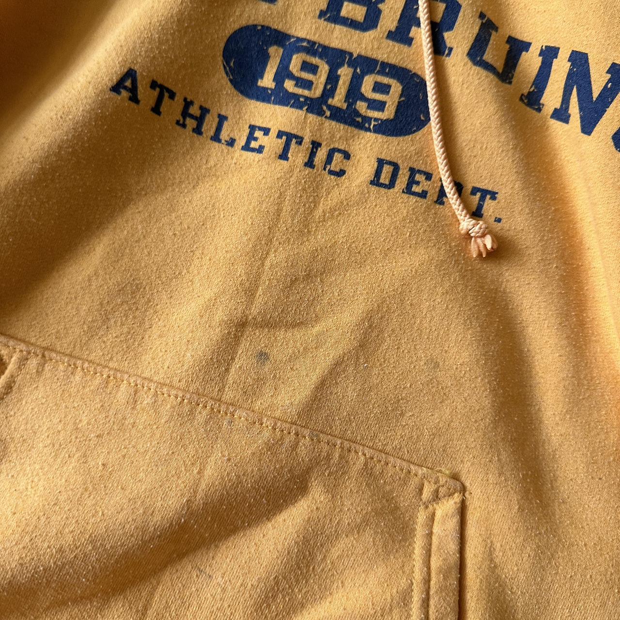 yellow ucla hoodie w small stain in front Depop