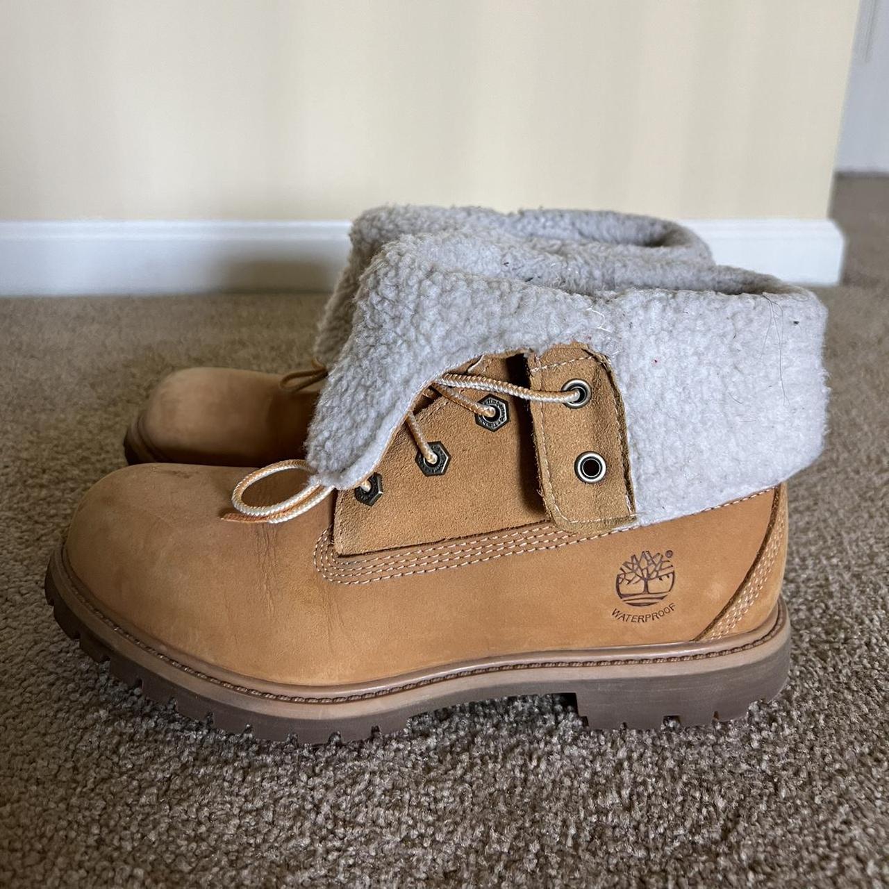 Tan and white top timberlands