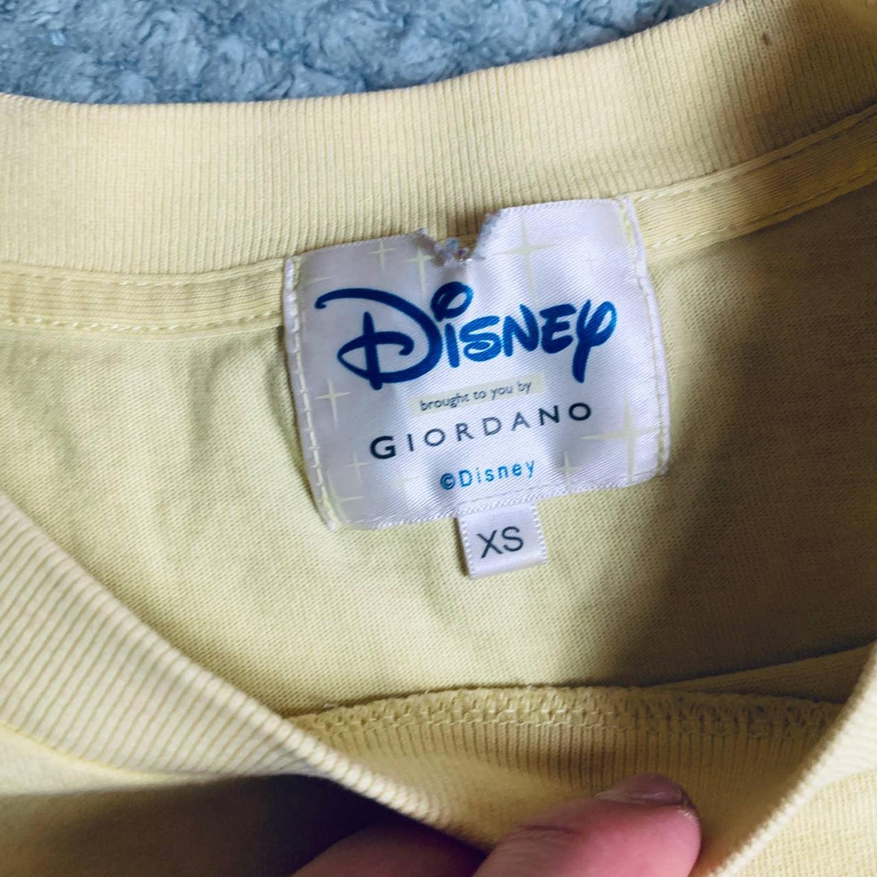 DISNEY x Giorano Vintage Eyeore Pale Yellow Graphic... - Depop