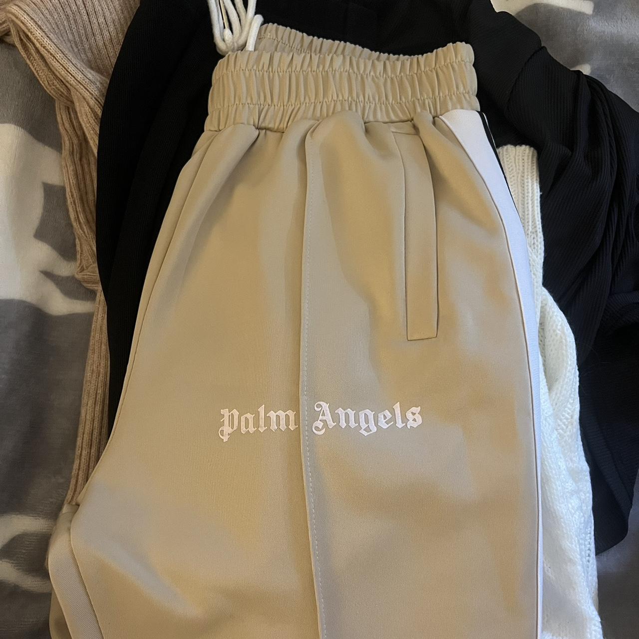 Palm angels beige tracksuit bottoms Size small - Depop