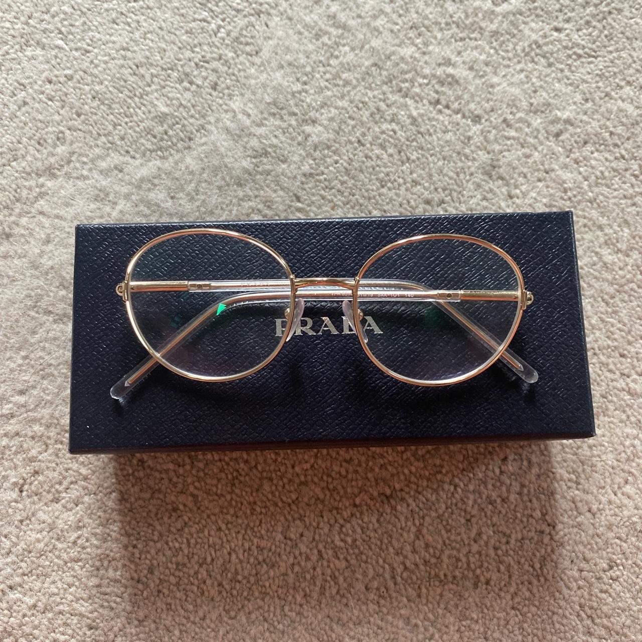 prada swirl glasses