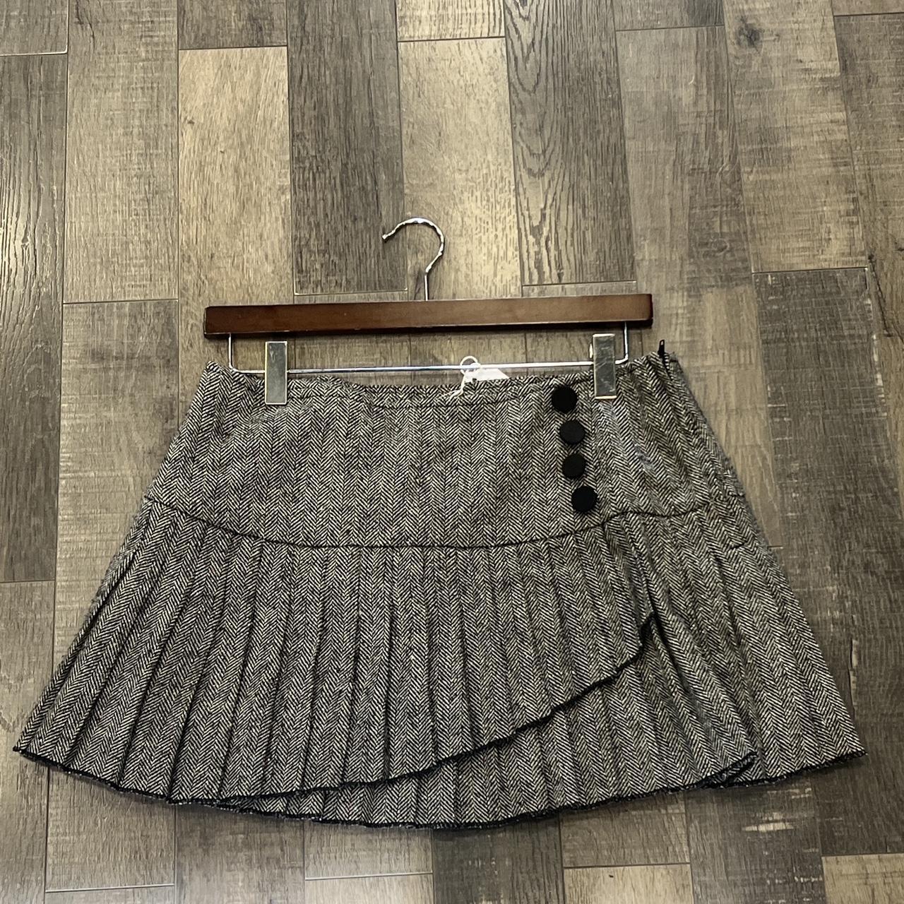 Really pretty grey mini skirt with asymmetric detail... - Depop