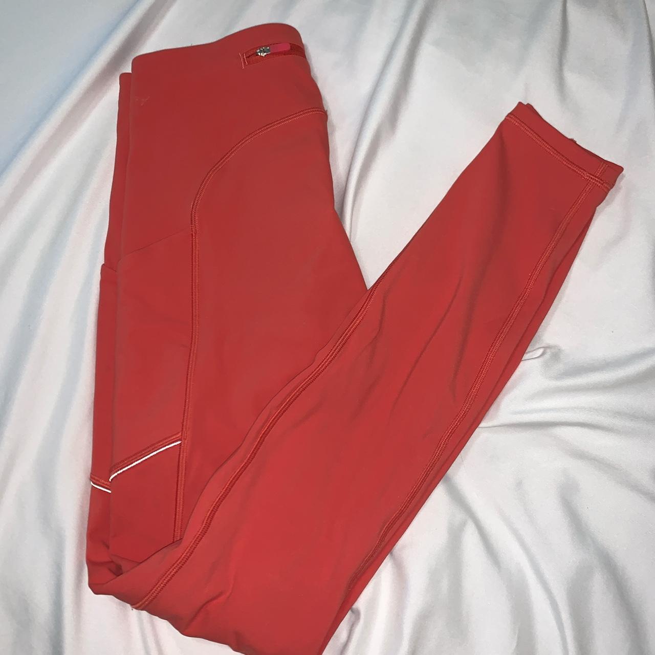 Coral Lululemon leggings. High impact, side pockets