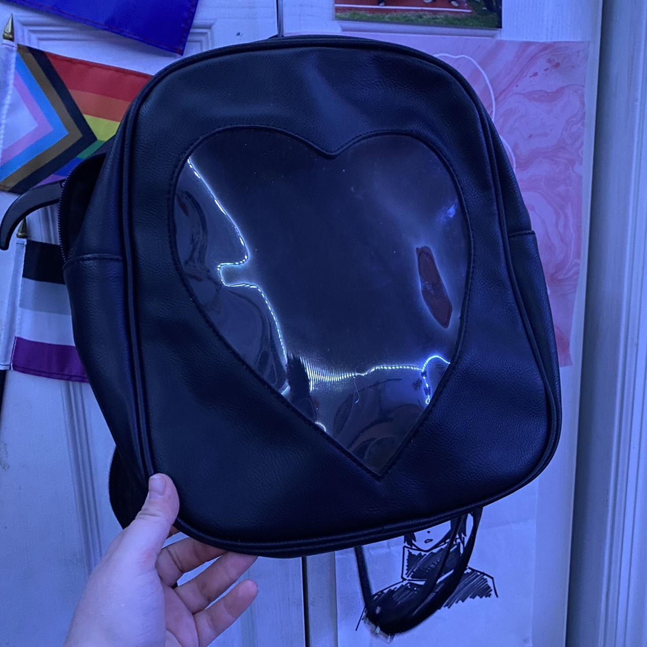 Black heart backpack ita bag from Hot Topic. Depop