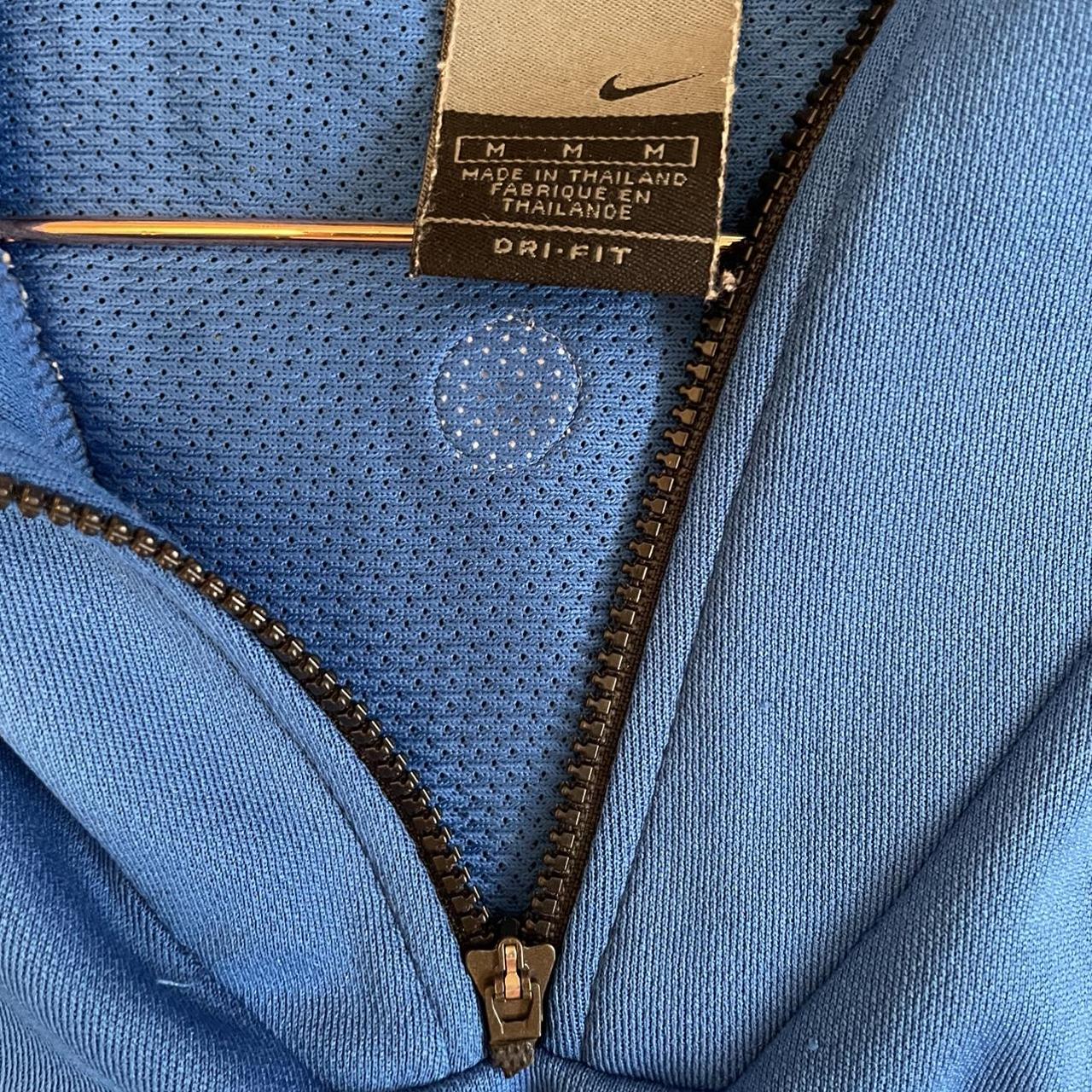 Nike Zip Polo Tagged Medium would fit up to XL... - Depop