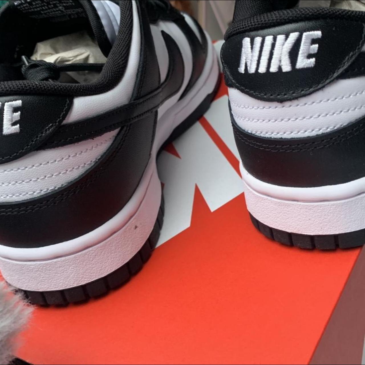 black and white nike trainers sports direct