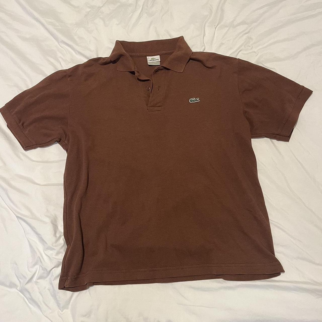 Brown Lacoste polo 8.5/10 condition lightly used... - Depop