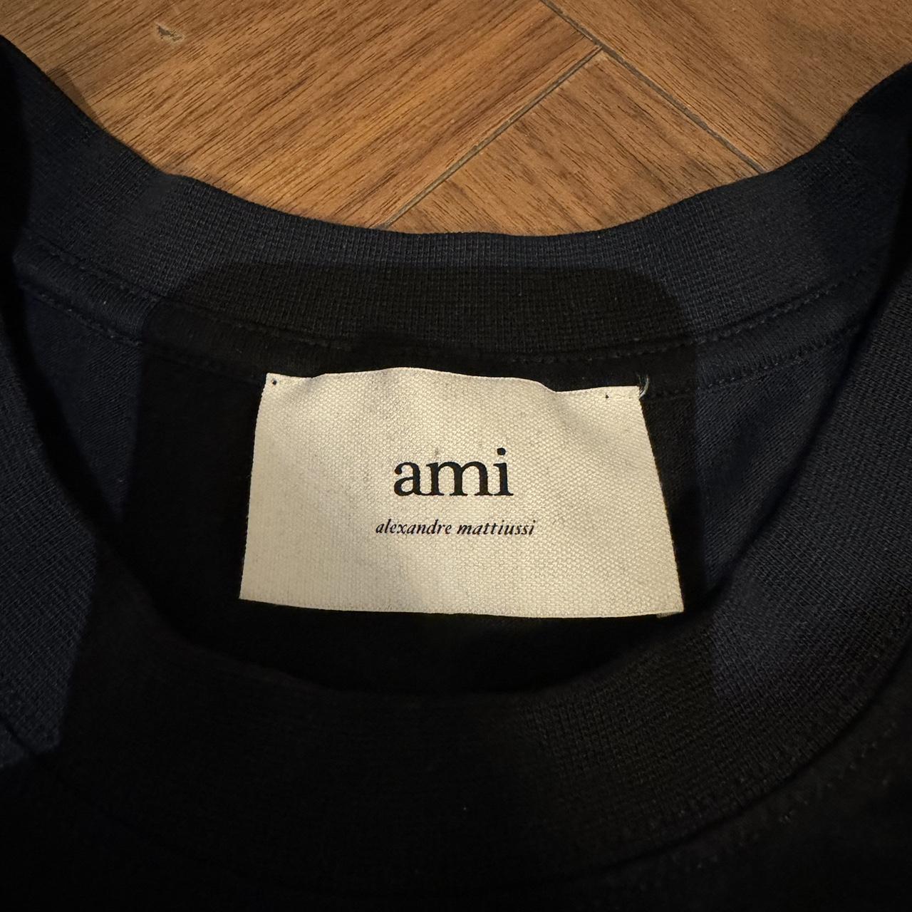 AMI PARIS black t shirt in size XL, excellent... - Depop