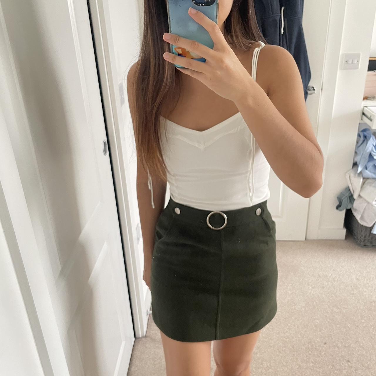 Asian branded green mini skirt, with zip fastening... - Depop