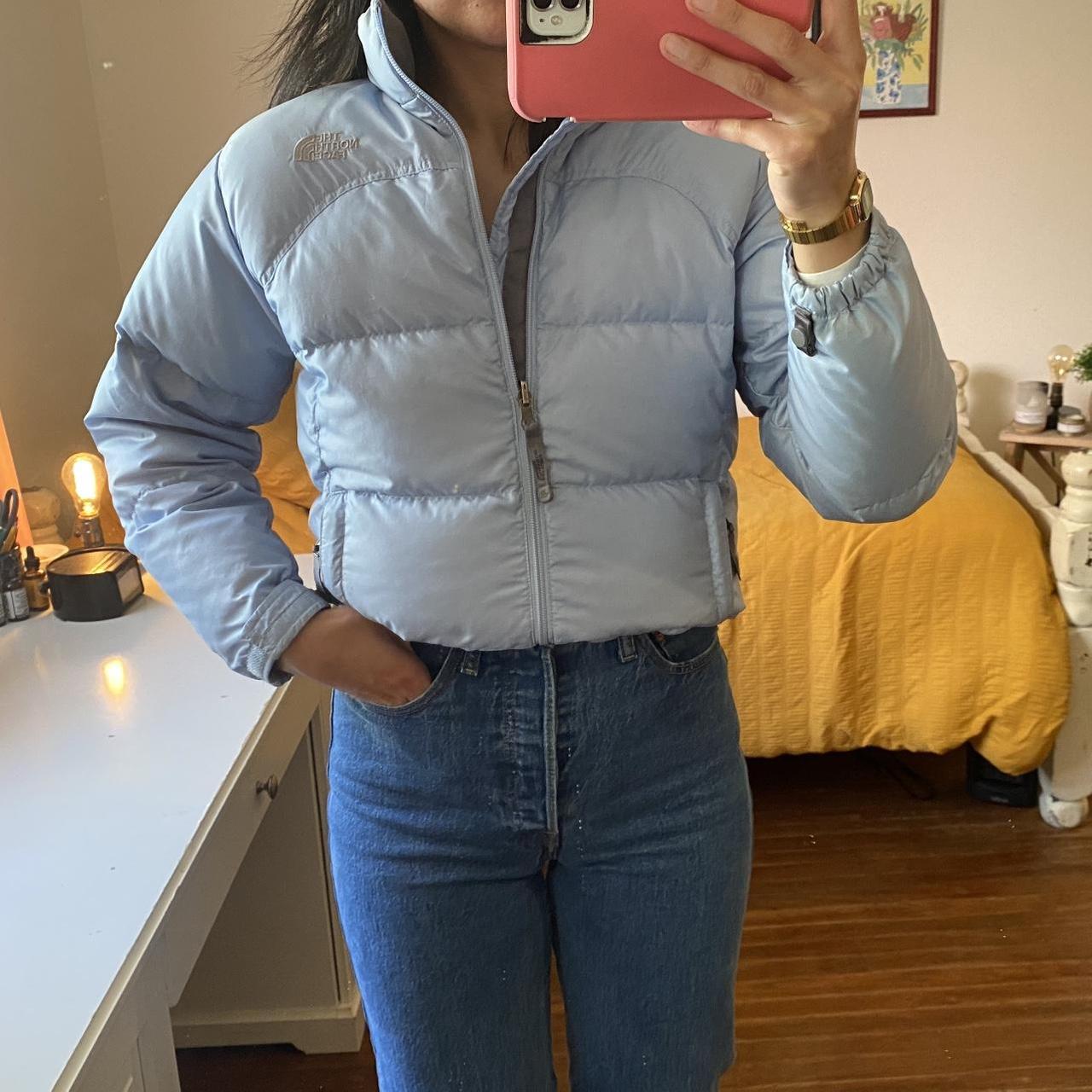 Baby blue north face deals puffer jacket