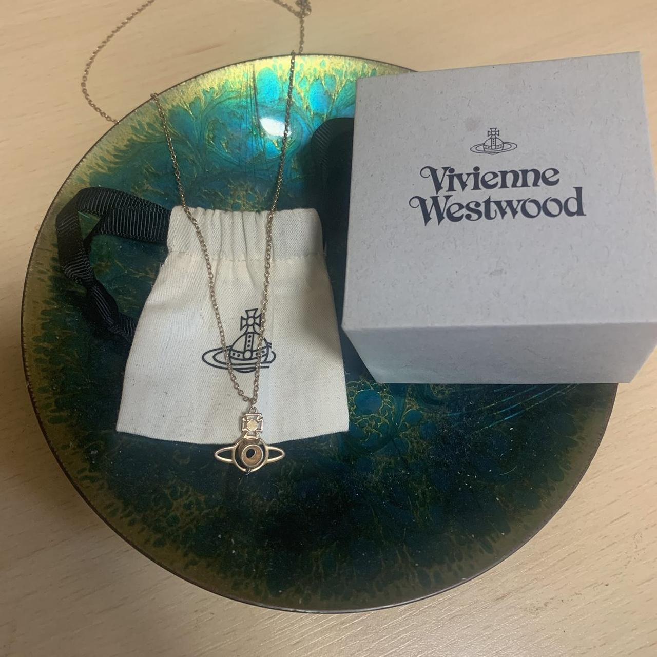 Vivienne Westwood gold orb pendant necklace, worn... - Depop