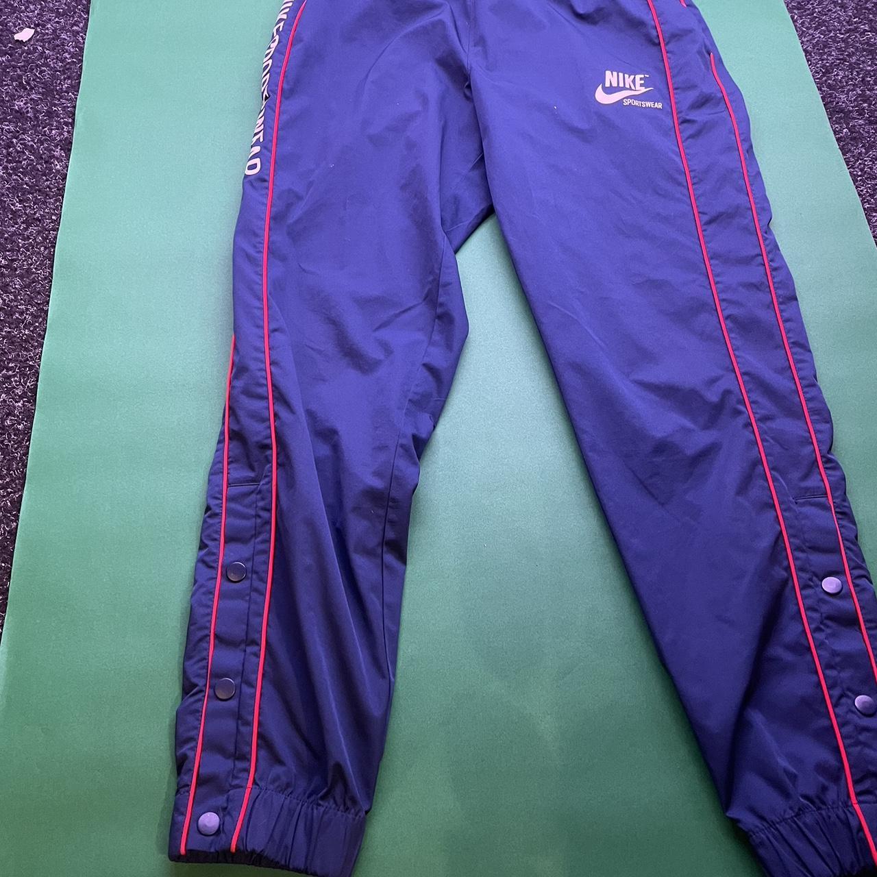 Nike tracksuit bottoms with poppers at ankles Depop