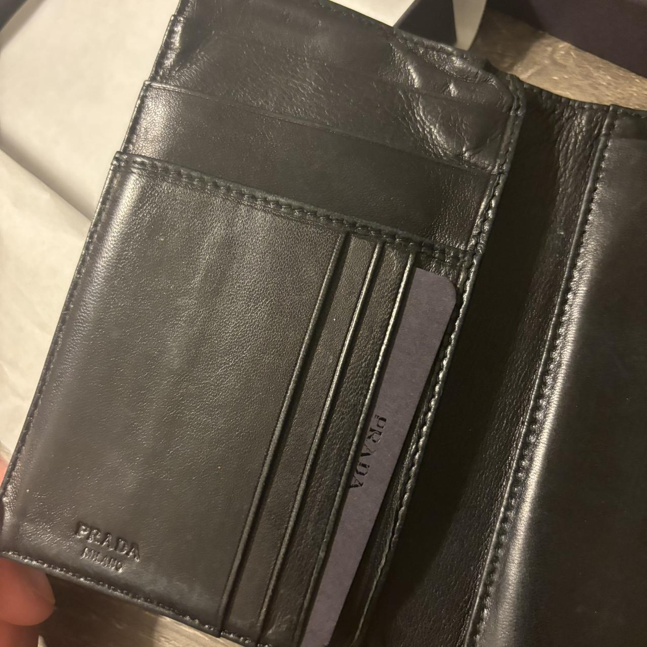 Prada black wallet Great condition Rare piece... - Depop